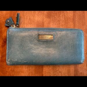 Team Tumi leather coated wallet